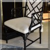 F12. Pair of Chinese Chippendale style black arm chairs. 35”h x 23”w 